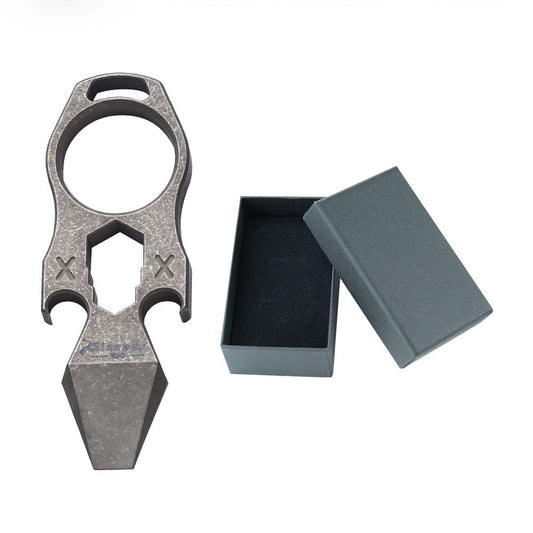Close-up view of the precision utility pry bar and solid brass mechanical accents
